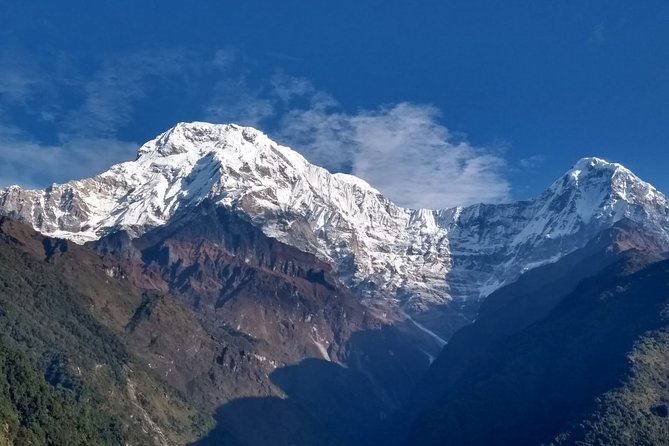 Annapurna base camp trek 5 Days - Turning point on the way back: sun over Machhapuchare and Annapurna
