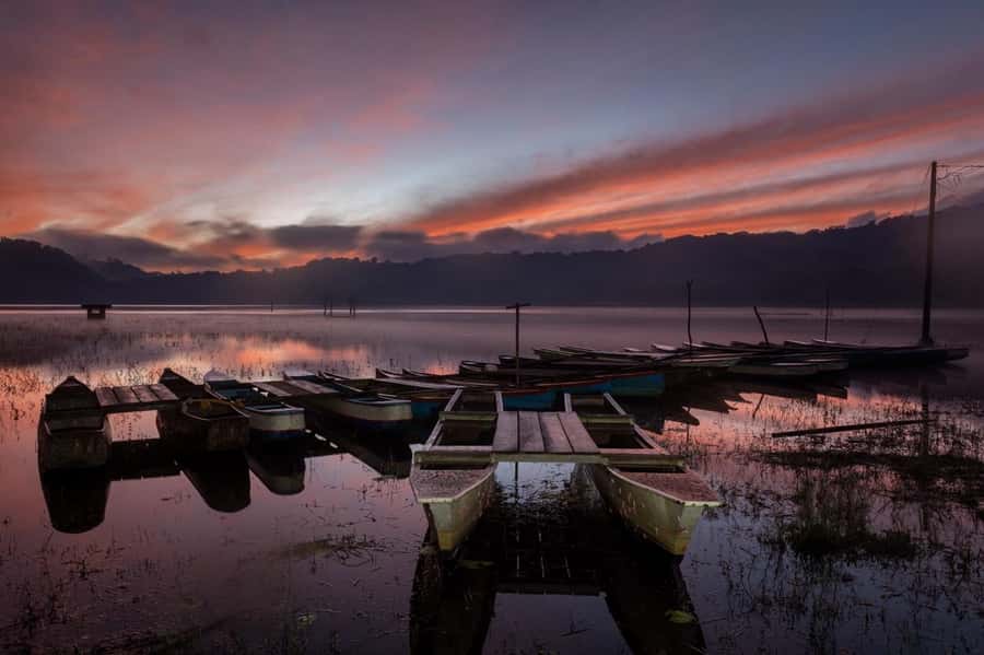 Bali: Munduk Waterfalls Trek, Twin Lakes and Temple Tour - The 30-Minute Wooden Canoe Ride to Tamblingan’s Temple Area