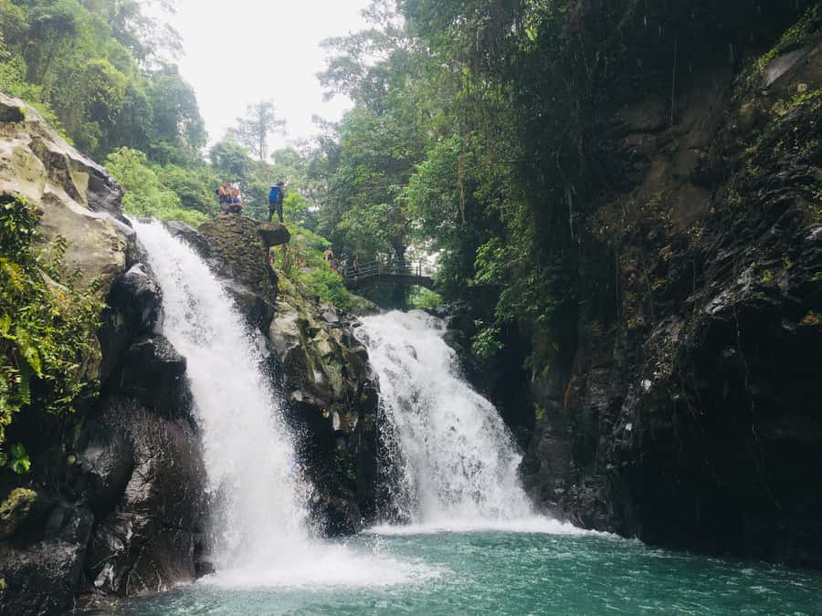 Bali: Sambangan Waterfalls Trekking, Sliding, & Jumping Trip - Safety and guide energy: why Putu and Panca stand out