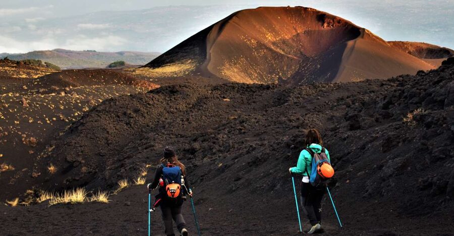 Catania: Etna Morning or Sunset Trek with Lava Tunnel & Gear - The lava-flow cave visit: entering the tube with helmet and flashlight