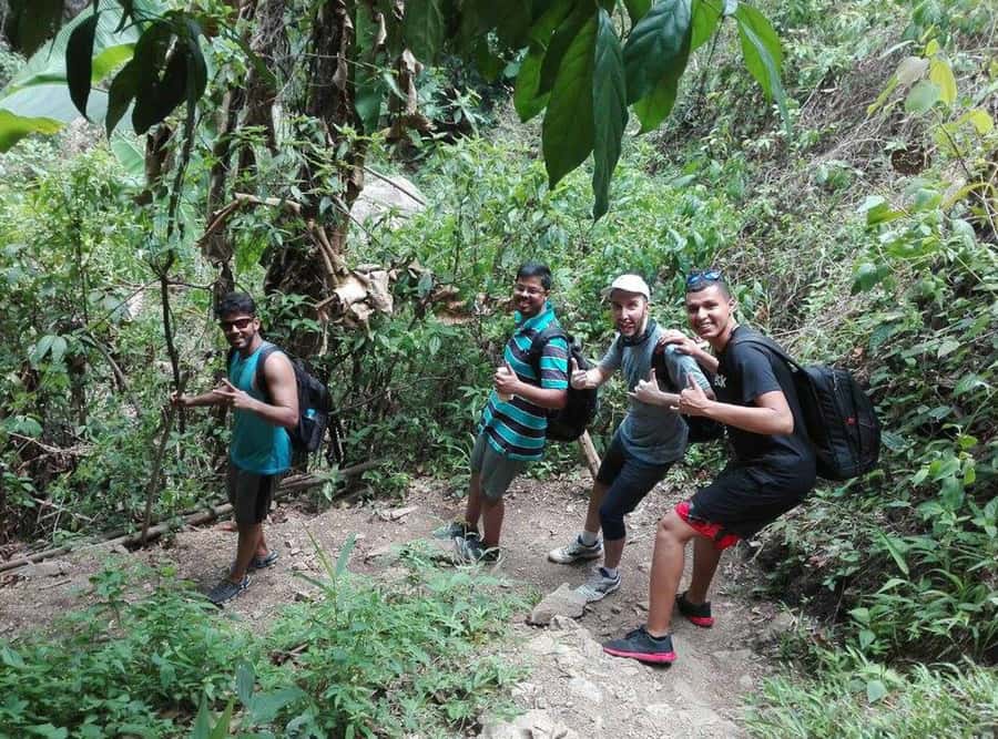 Chiang Mai: Whitewater Rafting and Waterfall Trekking Tour - Whitewater rafting in Mae Taeng: what Class III to IV feels like