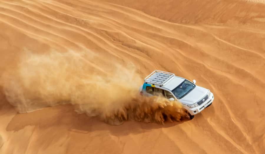 Dubai Sunrise Desert Camel Trek with Breakfast - Breakfast box in low seating: simple, filling, and practical