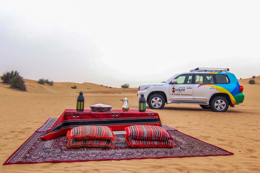 Dubai Sunrise Desert Camel Trek with Breakfast - Practicalities: what to wear, what to bring, and who should skip it