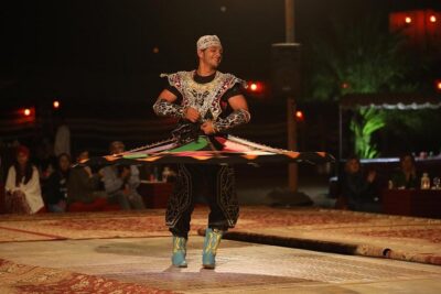 Dubai Sunset Camel Trekking with Shows & BBQ Dinner - Camel caravan and the sunset photo stop: what the ride is really like