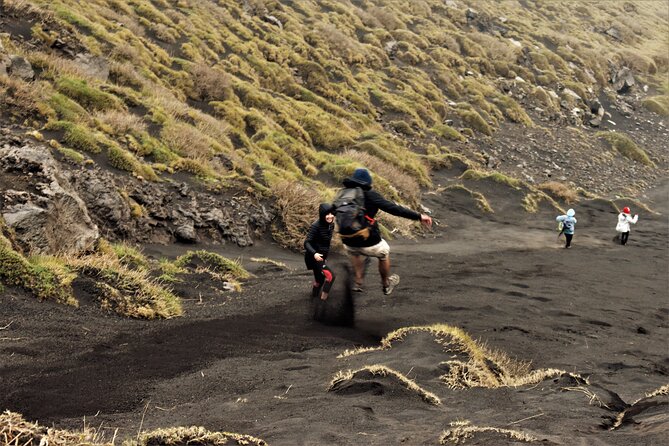 Etna's Hidden Gems - Trek Valle Bove & Lava Tunnel with Gear - Lava tuba time: helmets, flashlights, and underground geology
