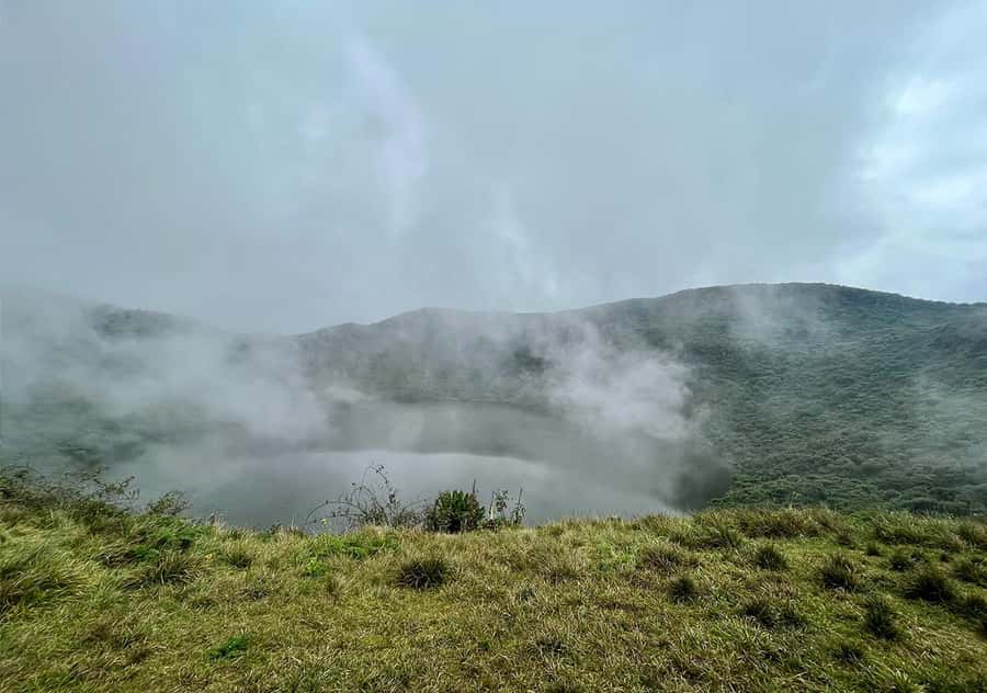From Kigali: Bisoke Summit Trek, Crater Lake 1 Day Safari - Descent, timing, and the ride back to Kigali