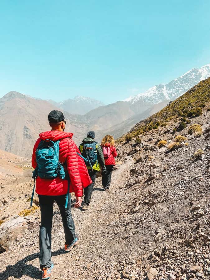 From Marrakech:Trekking in Atlas mountains 2 days - Day 2: Tizi Mzik Pass (2300m), Igholidn Waterfalls, then down to Imlil (1750m)