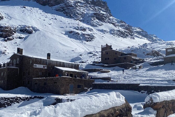 From Marrakesh: 2 Days Mount Toubkal Trek all inclusive - Summit Day on Mount Toubkal: sunrise, rocky steps, and the return