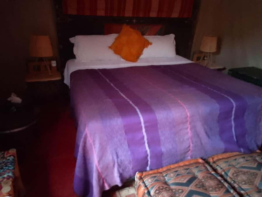From Merzouga: Overnight Camel Trek over Erg Chebbi Dunes - The camp night: tagine dinner, drum circle, and stars with real desert scale
