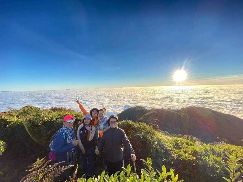 From Sa Pa: Full Day Trek of Fansipan Mountain - Summit time around 11:30–12:00: views over Sapa and China