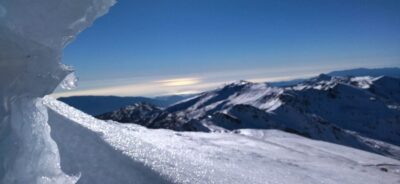 Granada: Sierra Nevada Veleta Peak Trek with Lunch - Reaching Veleta: The Summit Moment at 3,396 Meters