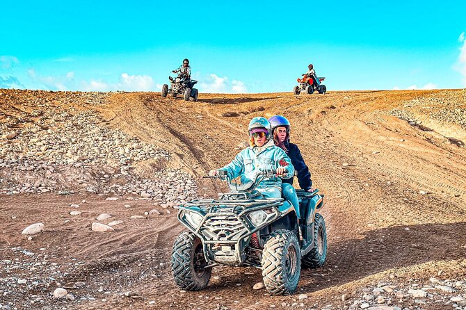 Marrakech: Agafay Desert Quad Biking & Camel Trek & Dinner & Show - Dinner under Berber tents: meal, music, and the wait factor
