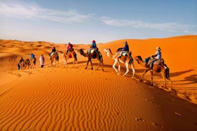 Merzouga: Overnight Camel Trek with Sandboarding - The Camel Trek Through Erg Chebbi Dunes at Sunset