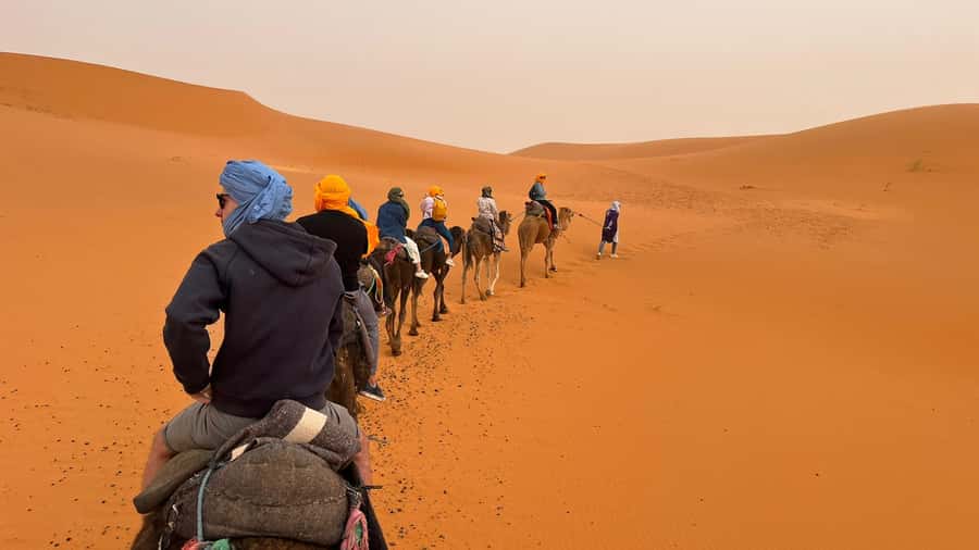 Merzouga: Overnight Camel Trek with Sandboarding - Sandboarding in the Dunes: Optional Fun With Realistic Expectations