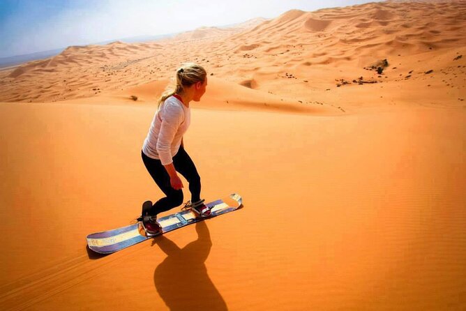 Morning Dune Bashing with Camel Trekking and sand boarding - Optional Quad Bike Upgrade: Add $28 for Extra Speed