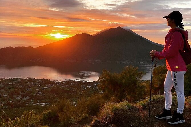 Mount Batur Sunrise Trekking - All Inclusive - Sunrise from Mount Batur: clouds, three volcanoes, and Lake Batur