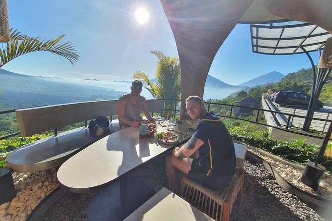 Mount Batur Sunrise Trekking (Private Tour and Breakfast at Restaurant) - Lake Batur and the crater-lake backdrop on the descent