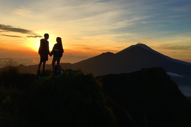 Mount Batur Sunrise Trekking With Local Guide - The dark-hike part: flashlight, walking support, and a calmer summit