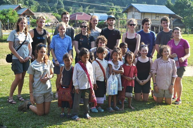 Nalan Trail and Khmu Tribe: 2 Days Trek in Nam Ha NPA - Day 2 morning: village time, Lao coffee, crossbow shooting, rice pounding