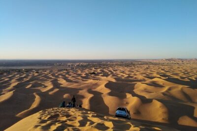 Overnight Camel trek in Merzouga dunes - Day 1: camel trek, sandboarding, sunset dune climb, then Tuareg drums