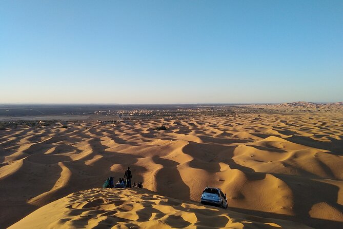 Overnight Camel trek in Merzouga dunes - Day 1: camel trek, sandboarding, sunset dune climb, then Tuareg drums