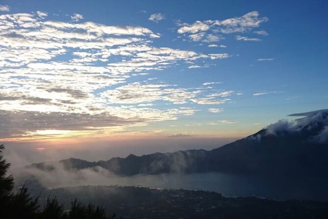 Sharing Mount Batur Sunrise Trekking Guide Pick Up and Drop Off - After the sunrise: crater views and getting back down