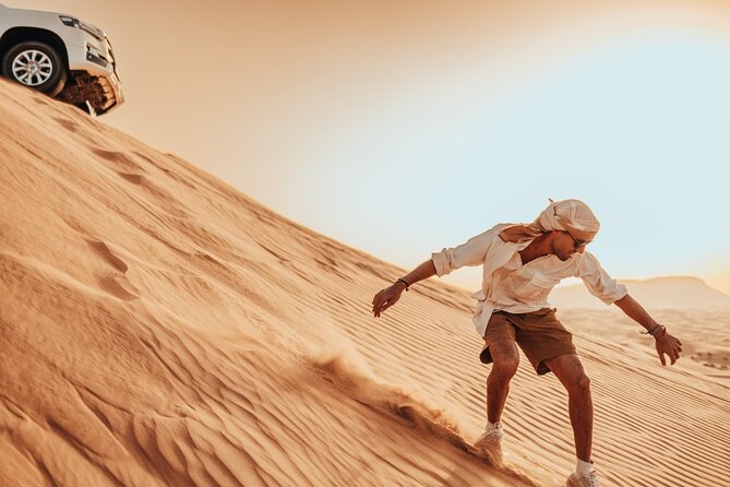Sunrise/Morning Dune Drive with Camel Trek & Sand Surfing - Key highlights you’ll remember
