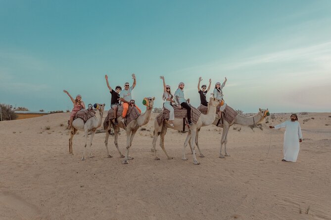 Sunrise/Morning Dune Drive with Camel Trek & Sand Surfing - Sandboarding Down the Dunes: Included and Surprisingly Fun