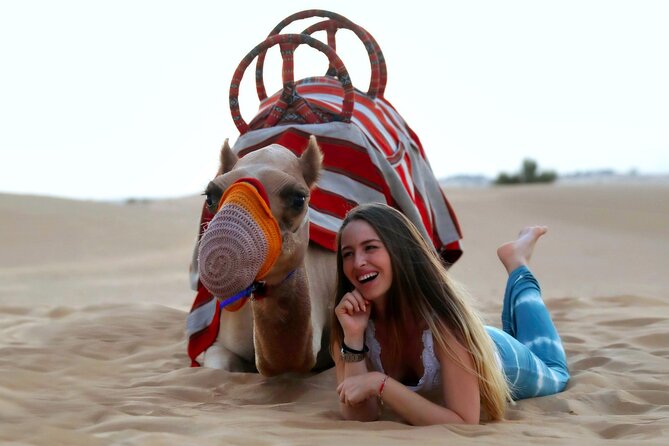 Sunset Camel Trek & Red Dunes Safari with BBQ at Al Khayma Camp From Dubai - Camel Trekking and Camel Feeding: More Than the Usual Photo Stop