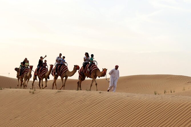 Sunset Camel Trek & Red Dunes Safari with BBQ at Al Khayma Camp From Dubai - The Shows: Belly Dance, Fire, and Tanoura Under Desert Stars