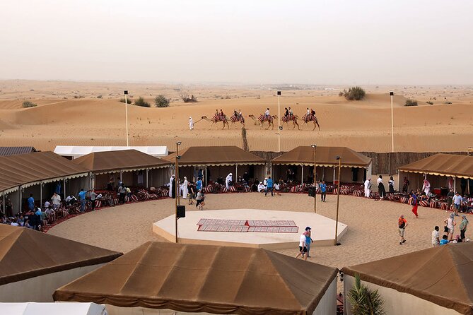 Sunset Camel Trek & Red Dunes Safari with BBQ at Al Khayma Camp From Dubai - Camp Arrival in the Majilis: Coffee, Dates, and Hands-On Culture