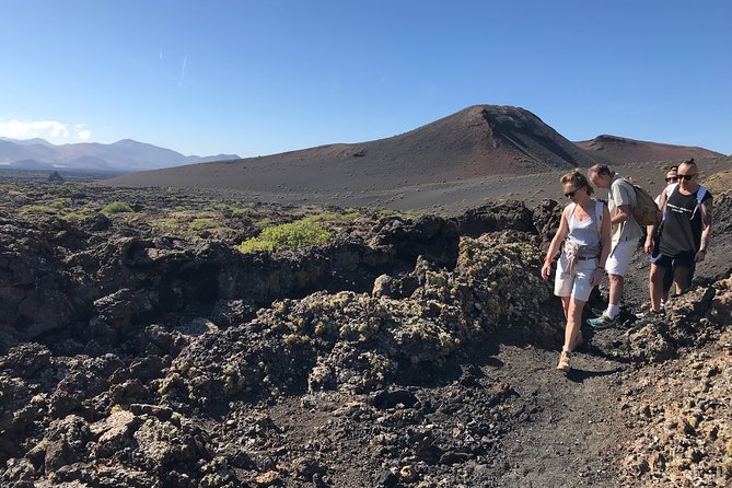 Volcano Trekking Tour (Timanfaya eruptions) - Gear and Comfort: Walking Poles and Rain Jackets